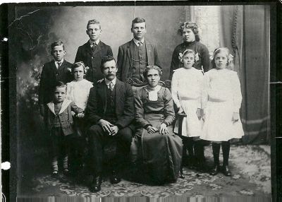 PEREIRA Family (1910)
The original inhabitants of Spring Vale, taken in 1910:
Left to right:

Back row (3 tallest children):
1) Alf Pereira (tall boy in dark suit)
2) Clarrie Pereira (with vest and watch chain)
3) Mavis Pereira

Middle row (3 middle children):
1) Arthur Pereira (boy in suit on left hand side)
2) Pearl Pereira (in front of Mavis)
3) Ruby Pereira

Front row:
1) Selby Pereira (hand resting on chair)
2) Eva Pereira
3) George Pereira
4) Charlotte Pereira
Keywords: PEREIRA