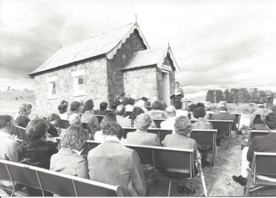 Centenary Service at Parkwood - Nov 1980 - Rev Peter Fuller reading Family Bible
