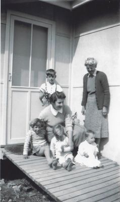 Elsie Kilby standing with daughter Margaret, and grandchildren, John (standing), Christine, Peter and Elizabeth
