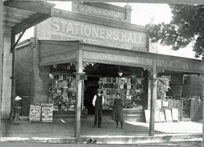 John Bembrick and shop assistant outside his Harden shop - 21 Feb 1921 (2)

