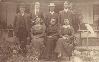 Smith family - Edward B Percy, Rev TJF Boyer, Ellis Smith in white hat, and Leon Smith Front - Beatrice, Jane and Elvina
