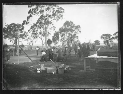 Tennis party at Jack Southwells & First tennis club in city area, near Lyneham & Fred on court (right)
